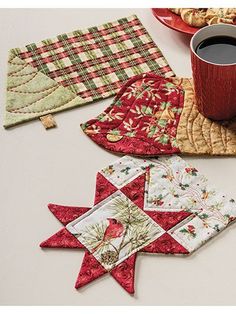 a magazine cover with quilts and coffee on the table