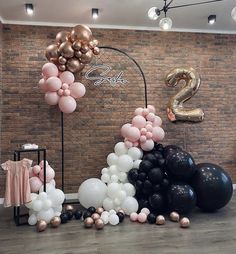 balloons are arranged in the shape of flowers and numbers