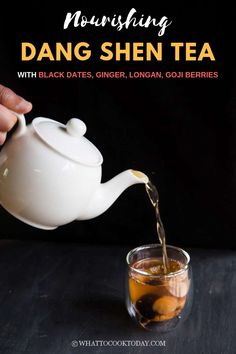 a person pouring tea into a glass cup with oranges in it and the words, nourishing dang shei tea