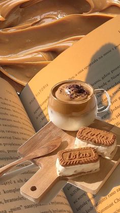 an open book with some cookies on it