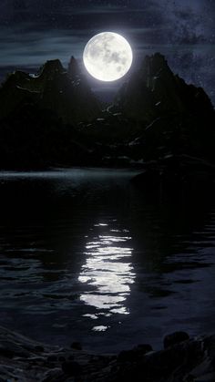 the full moon is reflected in the water