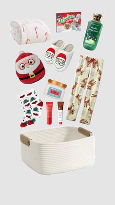 the contents of a christmas gift set including socks, santa's hat and other items