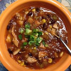 a close up of a bowl of food on a table