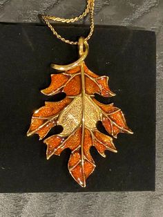 Elegant Gold Tone Amber Enameled Leaf Pendant Necklace with Gold Heart Design, 24" Chain, Hangs 12" A beautiful pendant to add a touch of Fall to your attire. The added heart shape on the leaf makes this necklace unique. Necklace Unique, Leaf Pendant, Gold Heart, Unique Necklaces, Heart Of Gold, Heart Design, Heart Shape, Jewelry Necklace Pendant, Heart Shapes