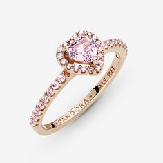 Add a sophisticated touch to your look with the Sparkling Elevated Heart Ring. The ring draws inspiration from the classic Pandora Timeless collection. Hand-finished in 14k rose gold unique metal blend, this piece features a pink heart-shaped central, elevated stone. Clear cubic zirconia create the halo and decorate half of the ring band, with the Pandora logo inside the shank. Stack this ring with hand-finished styles in sterling silver for a statement mixed metal look. - Pandora Sparkling Elev Rose Gold Pandora Ring, Pandora Rose Gold Ring, Pink And Gold Rings, Gold And Pink Ring, Pink Pandora Ring, Elegant Pink Gold Jewelry With Center Stone, Luxury Rose Gold Heart Ring For Valentine's Day, Elegant Pink Gold Rings With Accent Stones, Elegant Rose Gold Heart Cut Jewelry