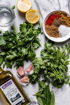 herbs, spices and seasonings on a marble counter top