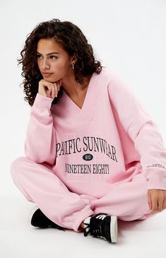 The Pacific Sunwear 1980 LA V-Neck Sweatshirt from PacSun offers a cozy and stylish look. Featuring a v-neckline, long sleeves, ribbed trimming, Pacific Sunwear Ninety Eighty front and wrist embroidery, and an oversized fit, this sweatshirt is perfect for casual, laid-back days.Solid color sweatshirtSoft fleece liningV-necklineLong sleevesDropped shouldersRibbed trimmingFront embroideryOversized fitModel is wearing a size XS/S60% cotton, 40% polyesterMachine washableModel measurements: 5’5” height, 31” bust, 23” waist, 36” hips PacSun Womens Pacific Sunwear 1980 LA V-Neck Sweatshirt - Pink size M/L Sporty V-neck Sweatshirt For Fall, V-neck Sweatshirt With Ribbed Cuffs For Loungewear, Sporty Long Sleeve V-neck Sweater For Fall, Oversized V-neck Sporty Sweatshirt, Oversized V-neck Top With Letter Print, Retro V-neck Winter Tops, Sporty V-neck Sweatshirt With Ribbed Cuffs, Sporty Cotton V-neck Sweatshirt, Retro V-neck Relaxed Fit Top