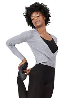 If your studio space runs a little cold, this Wrap Sweater is the perfect solution. Made of a soft knit blend. Features long sleeves and a self-tie for multiple tying options. Ribbing detail creates a fitted shape that highlights the dancer's form. Layer over leos or everyday wear to stay warm no matter where you are. Product Features: Ribbed wrap top 50% Rayon, 28% Nylon, 22% Polyester V-neck Self-tie Long sleeves Recommended care: Machine wash cold, delicate cycle and hang dry Capezio 11381W Yoga Wrap Sweater, Knit Wrap Sweater, Cheer Outfits, Gymnastics Outfits, Mens Tights, Sweater Fits, Knit Wrap, Studio Space, Wrap Sweater