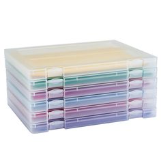 a stack of multicolored plastic storage containers