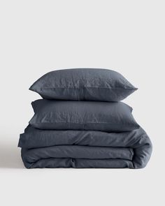 three pillows stacked on top of each other