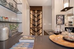 a wine glass sitting on top of a counter