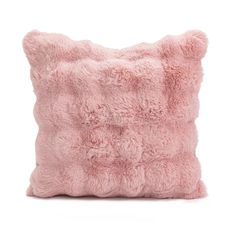 a pink pillow on a white background