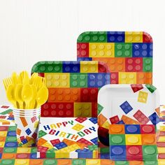 lego party supplies including plates, napkins and cups