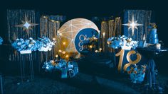 a blue and gold themed party with decorations