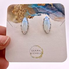 Discover A Touch Of Celestial Beauty With Our Moonstone Earrings. Crafted With Moonstone Opalite, These Elongated Studs Will Add A Touch Of Elegance To Any Outfit. Let The Iridescent Gems Illuminate Your Look And Make You Feel Like A Star In The Night Sky. Made Of: Moonstone Opalite Rhodium Plating (5 Microns) Over Brass Made In Brazil Disclaimer: Please Note That All Semiprecious Stones Have Imperfections And Are Part Of Their Own Beauty. Due To Changes In Lighting, A Product May Appear Differe Moon Stone Jewelry, Moonstone Earrings, Moonstone Jewelry, The Night Sky, Moon Stone, Night Sky, Rhodium Plated, Semiprecious Stones, Moonstone