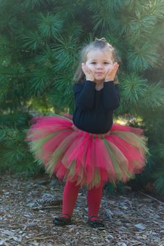 This red and green elf themed tutu is the perfect Christmas tutu. It also makes a great elf Halloween costume or photo prop for holiday photo shoots.  Your little one will adore wearing this while waiting for Santa or even while visiting Santa!   The tutu is made using high quality nylon tulle.  The tulle is pixie cut, meaning I have cut the ends at an angle to give the ends of the tulle a unique look that resembles the cut of elf skirts. This tutu is completely SEWN! I do not believe in using s Elf Skirts, Elf Costume For Kids, Elf Halloween Costume, Elf Halloween, Green Elf, Christmas Tutu, Holiday Photoshoot, Costume For Kids, Green Tulle