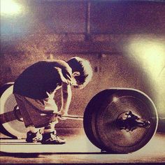 a man riding a skateboard on top of a metal object