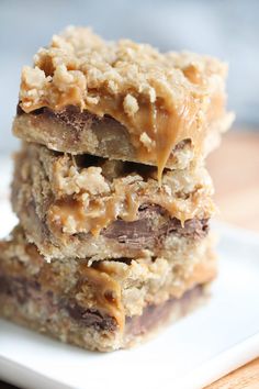 three pieces of chocolate and oatmeal bars stacked on top of each other