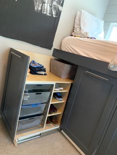 a bedroom with a bunk bed and drawers