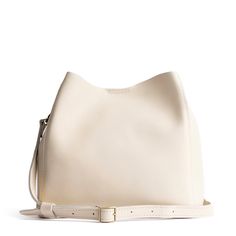 Bone | symmetrical bucket bag with latch closure and removable crossbody strap True Autumn, Portland Leather Goods, Butterfly Bags, Dramatic Classic, Purse Organizer, Leather Tote Purse, Canvas Purse, Utility Bag, Leather Stand