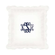 the monogrammed pillow is shown in blue and white with an initial on it