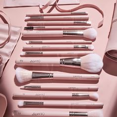 The perfect brush set to create sexy, sultry looks. This complete collection of 14 vegan & cruelty-free brushes for eyes, lip and face will make your look go from a spark to a flame. Includes: Large Rounded Brush F28 Medium Powder Brush F30 Angled Cheek Brush F21 Small Duo Fiber Face Brush F9 Tapered Blending Brush E2 Small Tapered Brush E9 Medium Shader Brush E4 Small Shader Brush E3 Small Dome Brush E18 Rounded Eye Defining Brush E26 Micro Blending Brush E28 Angled Eye Brush E6 Lip Brush L1 Br Makeup Brush Set Aesthetic, Makeup Brushes Aesthetic, Rose Makeup Brushes, Roses Makeup, Makeup Brush Roll, Rose Makeup, Free Brushes, Makeup Brush Kit, Skincare Cosmetics