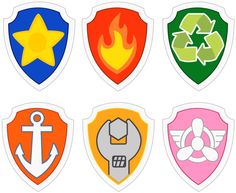 four different colored shields with arrows and stars on the sides, all in different colors