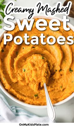 creamy mashed sweet potatoes in a white bowl with a spoon next to it and text overlay