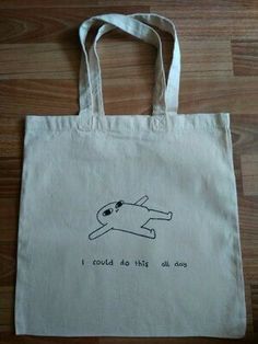 a tote bag with an image of a dog laying on its back and the words i could do this all day