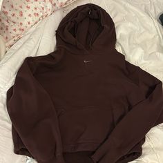 Nike Hoodie Xs Fits Like A Small Though Never Worn Brown Nike Hoodies, Nike Hoodie Colors, Nike Casual Brown Tops, Casual Brown Nike Top, Nike Long Sleeve Hoodie, Nike Hoodie With Drawstring Hood For Fall, Nike Hoodie With Double-lined Hood For Fall, Nike Fall Hoodie With Double-lined Hood, Sporty Brown Hoodie With Ribbed Cuffs