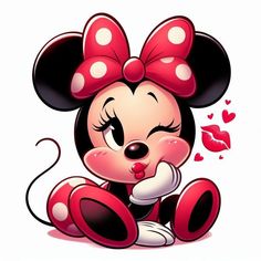 a cartoon minnie mouse sitting on the ground