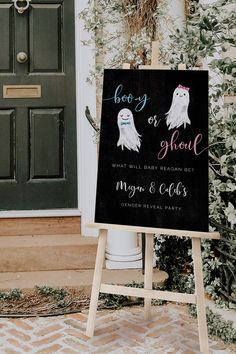 a sign that says boogy or ghost on it next to a door and steps