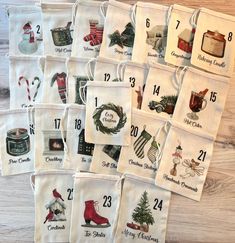 twelve tea bags with christmas themed items on them and numbered for each individual to use