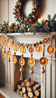 an orange slice garland is hanging on the mantle