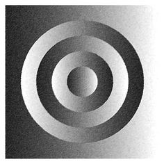 a black and white photo with an abstract design in the center that looks like a spiral