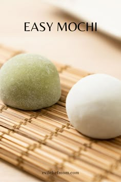 two balls of food sitting on top of a bamboo mat with the words easy mochi written above it