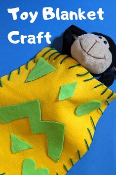 a stuffed animal laying on top of a yellow and green blanket with the words toy blanket craft written above it