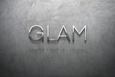 the word glam is made up of metal letters on a gray background with white lettering