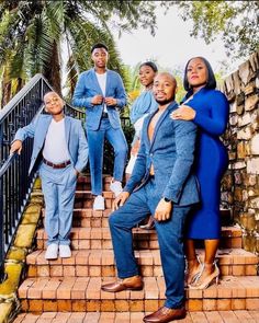 a group of people standing on some steps