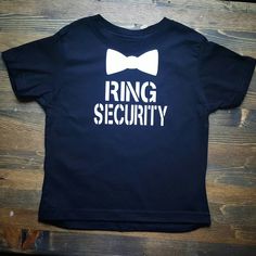 ring security t - shirt with bow tie on it