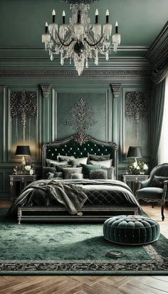 an elegant bedroom with green walls and chandelier