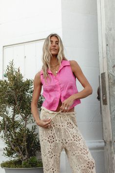 FINAL SALE. Expertly crafted from 100% linen, the Laurent Linen Button Vest adds a pop of pink to your wardrobe. This versatile vest offers a lightweight and breathable option for any outfit, perfect for warm weather days. Casual Pink Vest For Summer, Pink Linen Tops For Spring, Spring Linen Vest For Day Out, Casual Linen Beach Vest, Pink Linen Tops For Day Out, Summer Button Closure Vest For Day Out, Spring Linen Beach Vest, Spring Vacation Tank Top With Buttons, Pink Linen Summer Tops