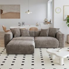 a living room with a large sectional couch