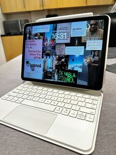 an open laptop computer sitting on top of a table