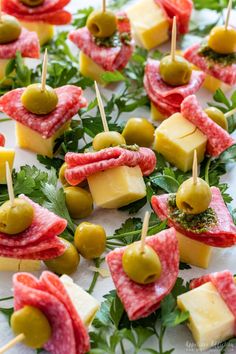 small appetizers with olives, cheese and parsley