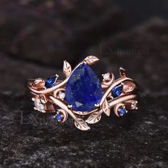 Item description ✦ Handmade item! ✦ Material: 925 sterling silver, Solid 10k/14K/18K GOLD (can be made in white/rose/yellow gold) Engagement ring ✦ Center stone: Natural Lapis Lazuli ✦ Size/Weight: 6x8mm Pear Cut ✦ Side stones: Marquise Cut Lab Blue Sapphire and Round Cut Moissanites Wedding band ✦ Gemstones: Lab Blue Sapphire and Moissanites Any ring size can be made,if the ring size is not in the option list ,contact me. As it is handmade,it needs 2-4 weeks to finish and then be shipped by usp Gold Rings With Blue Stones, Lapis Lazuli Engagement Ring, Pear Cut Sapphire Ring, Engagement Ring Blue Stone, Sapphire Wedding Ring Set, Emerald Engagement Ring Green, Ring Blue Sapphire, Unique Engagement Ring Settings, Nature Inspired Rings