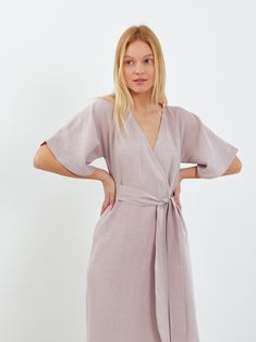 "MARY is a short sleeve midi linen wrap dress. DETAILS - Wrap robe - Self tie belt - Dolman style sleeves - Knee length - 100% lightweight European linen fabric - Cut and sewn to order just for you in our studio COLOR - Silver Pink, you can also choose other colors above - Fabric samples are available here https://www.etsy.com/listing/586569696/linen-fabric-samples SIZING & FIT - Relaxed fit - True to size - Measurements taken from a size S - Model is 5'8\" / 173cm and wearing a size S CARE FOR LINEN - Machine wash up to 30ºC/86ºF gentle cycle - Lay flat to dry or tumble dry low - Warm iron if needed - Do not bleach SIZE GUIDE Size conversion guide Size XS (US 0-2, IT 36-38, UK 4-6, Japan 3-5, France 32-34) Size S (US 4-6, IT 40-42, UK 8-10, Japan 7-9, France 36-38) Size M (US 8-10, IT 44- Fitted Knee-length Linen Wrap Dress, Beach Linen Wrap Dress, Midi Length, Summer Midi-length Rayon Wrap Dress, Spring Linen V-neck Wrap Dress, Belted V-neck Linen Midi Dress, Womens Bridesmaid Dresses, Kimono Wrap Dress, Linen Wrap Dress, Summer Linen Dresses