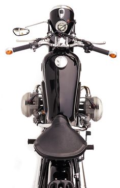 the front view of a black motorcycle on a white background