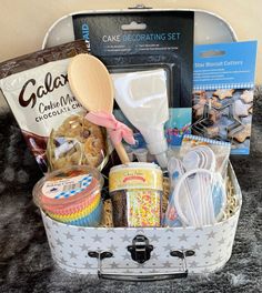 a basket filled with lots of food on top of a table