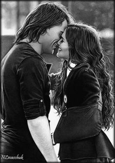 two people that are kissing each other in black and white with the caption's name